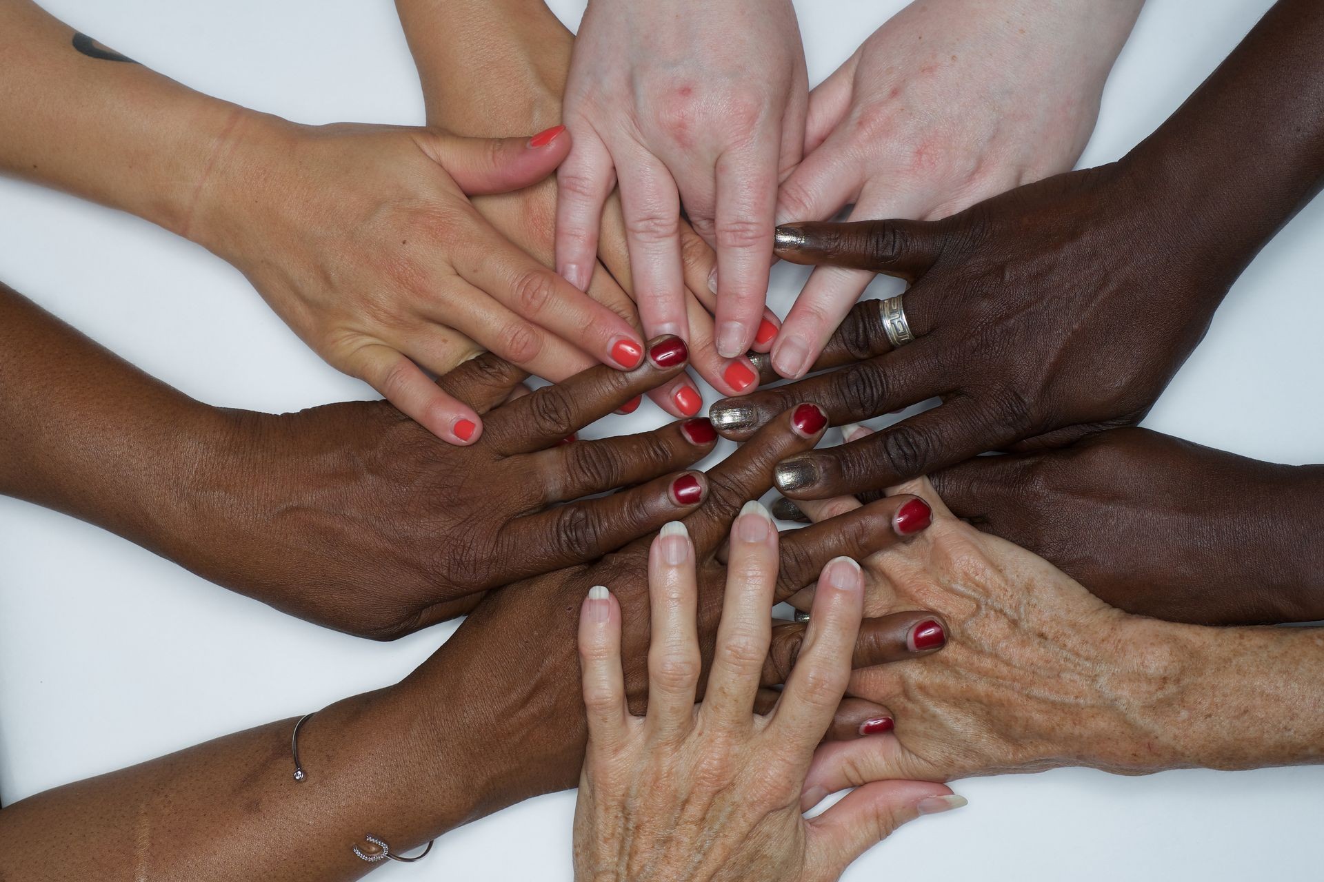 Diversity,  Hands of women of many colors represent the strength of women united